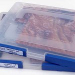 Dungeon Tiles in hanging project cases